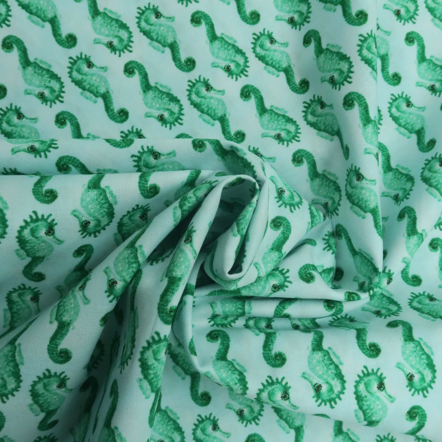 Green Seahorses on White Background Printed Cotton