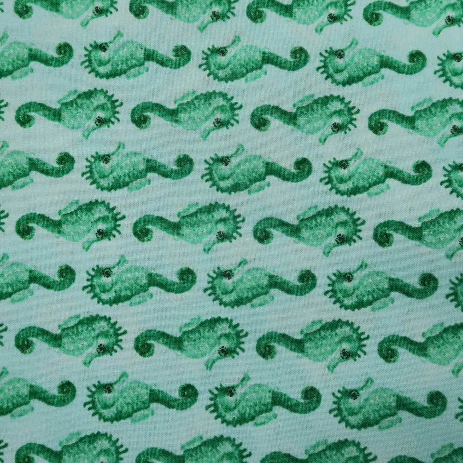 Green Seahorses on White Background Printed Cotton